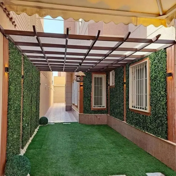 تركيب مظلات استرحات مع العشب الصناعي في بالدمام 